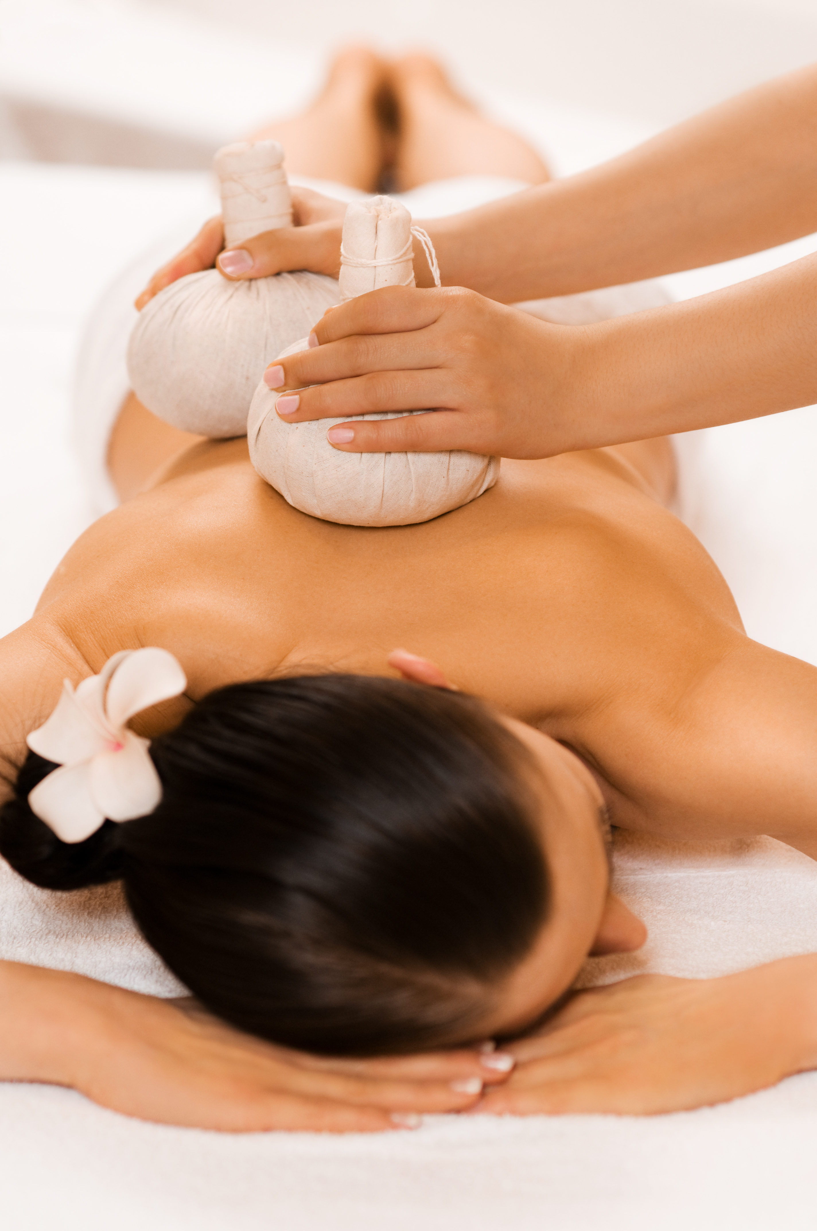 Kräuterstempelmassage